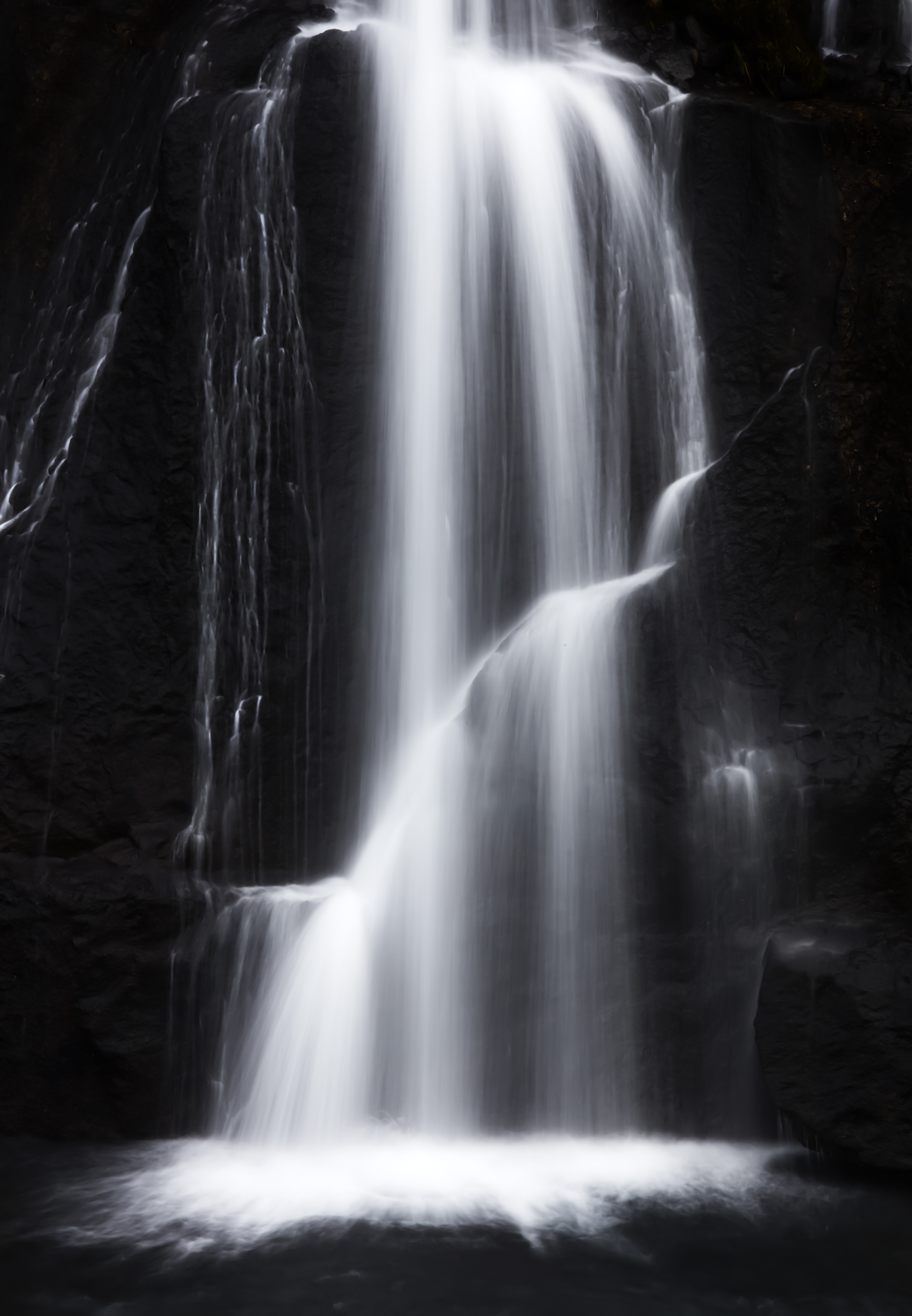 Long exposure waterfall demonstrating linear thrust and flowing recursion