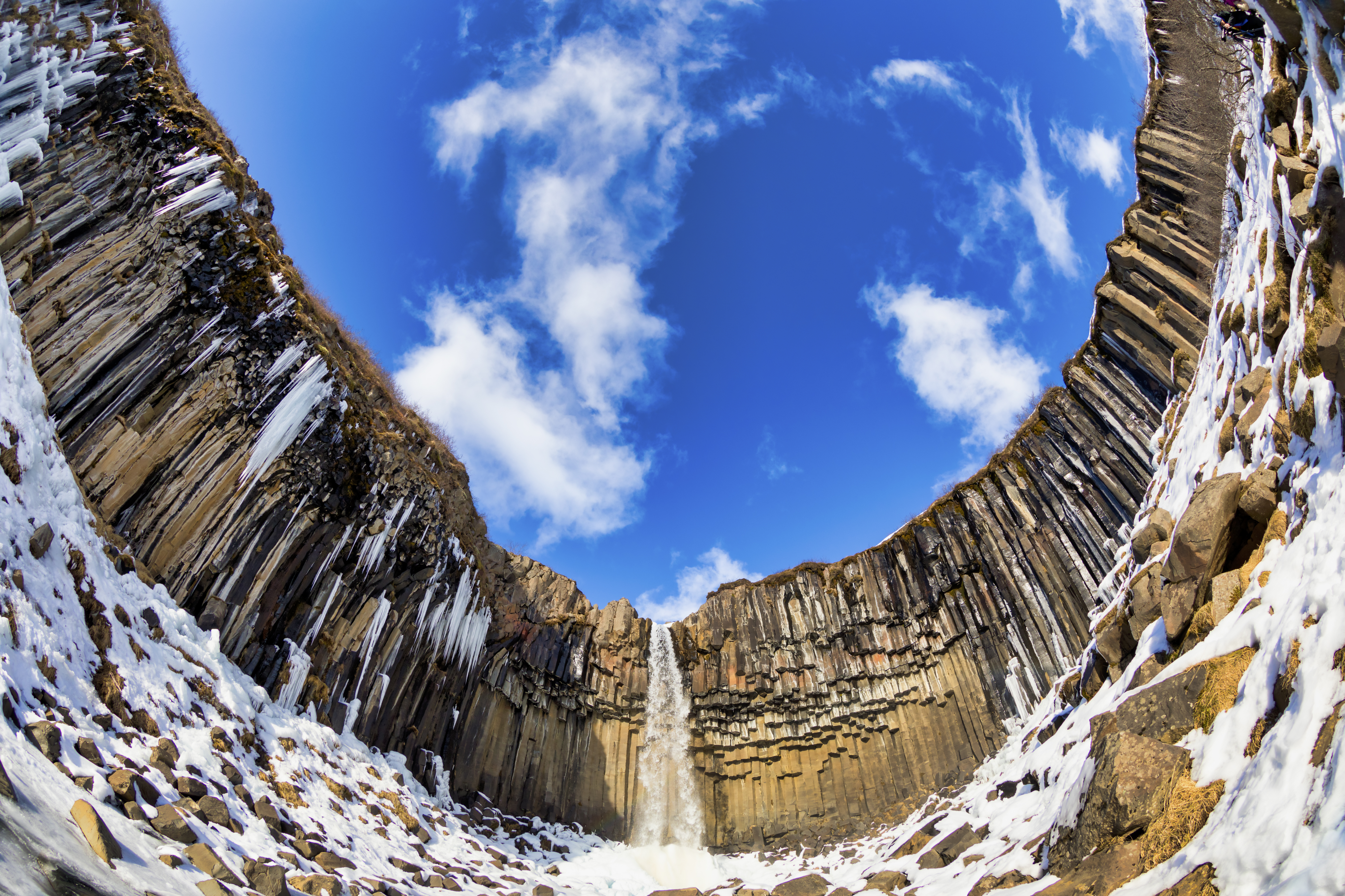 Curved basalt columns forming a harmonic stone chamber — visual echo of ancient sonic temples and resonance design | Robbie George Photography