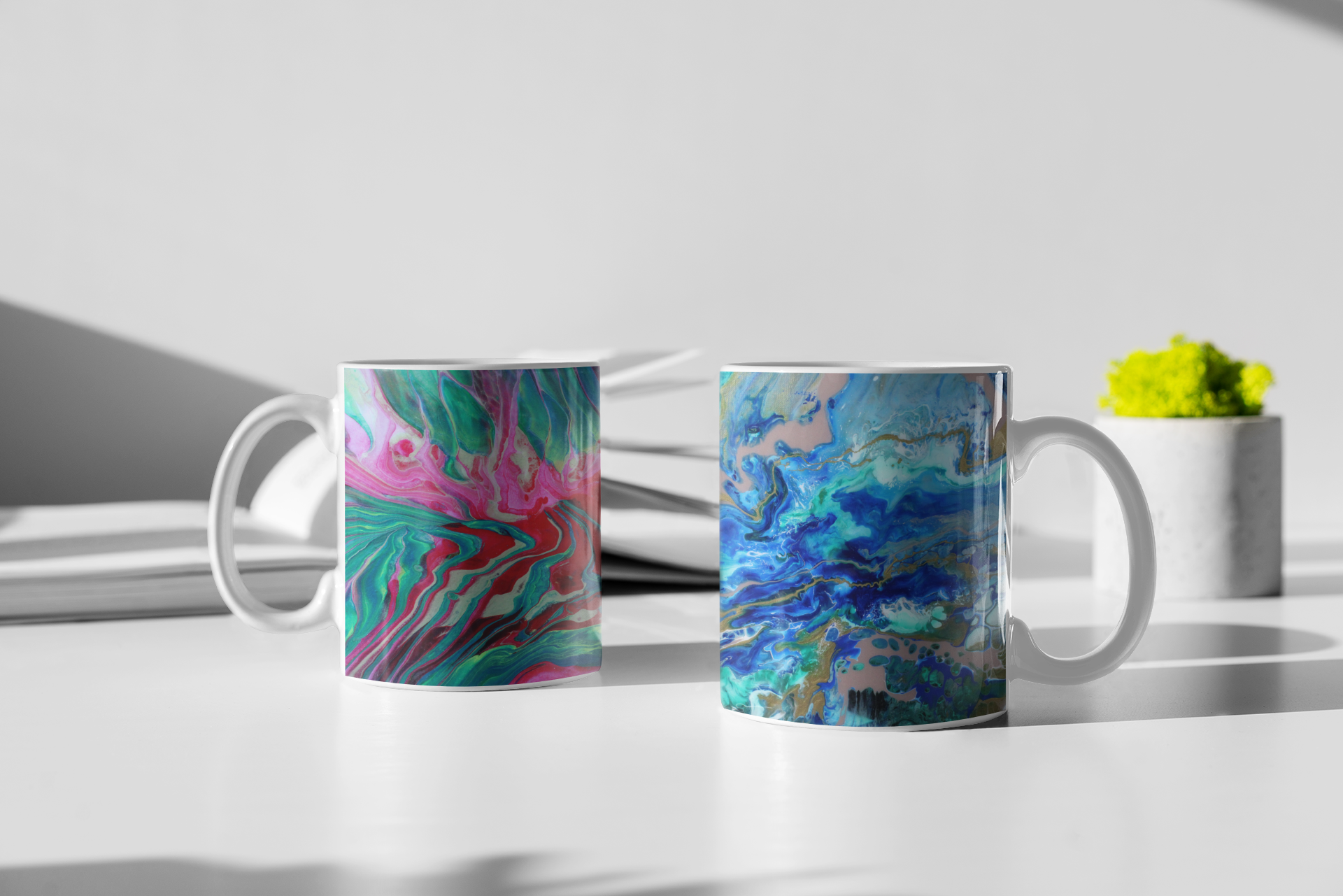 Two mugs shown on a counter.