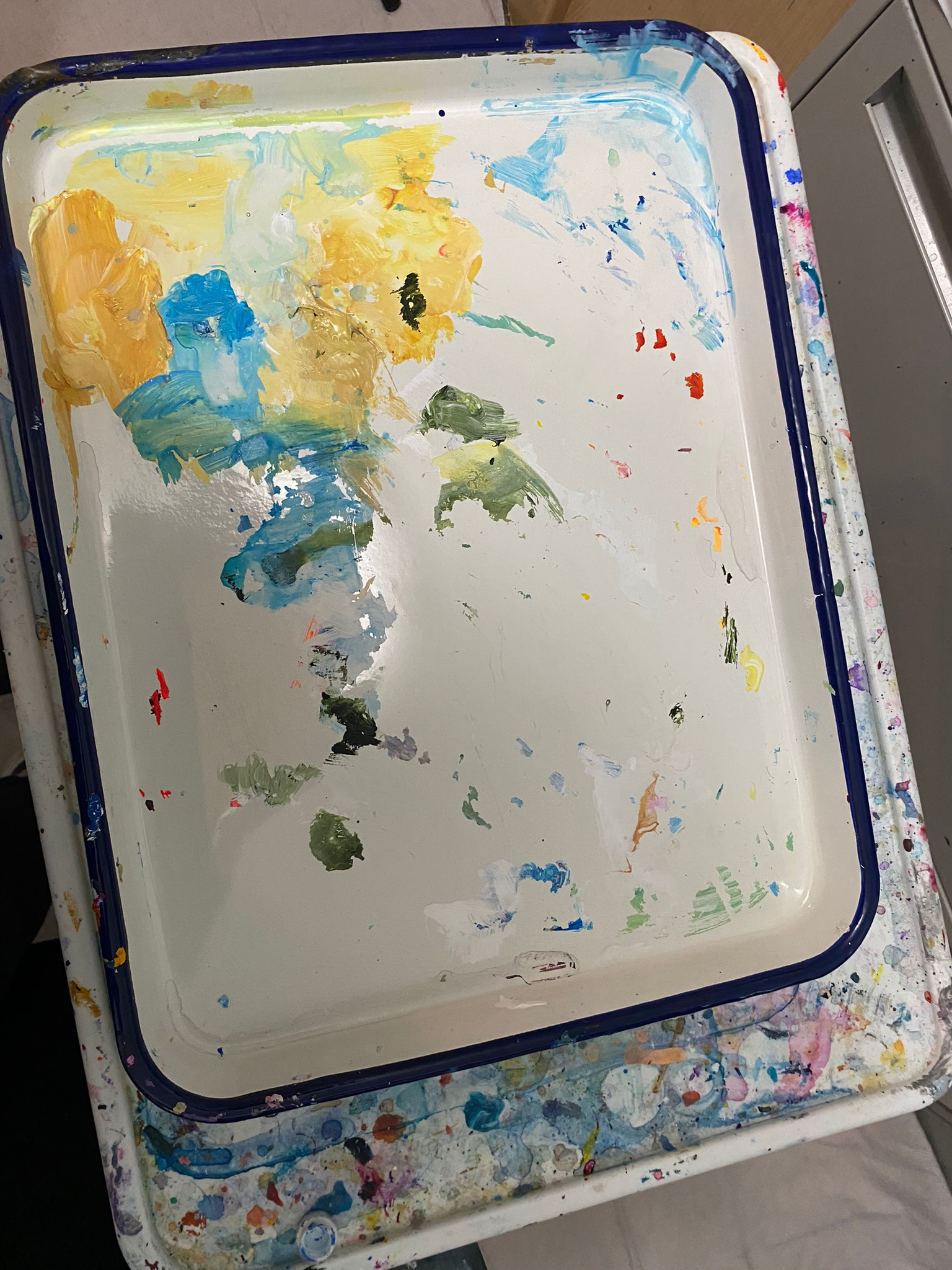 Paint tray close-up — palette in process