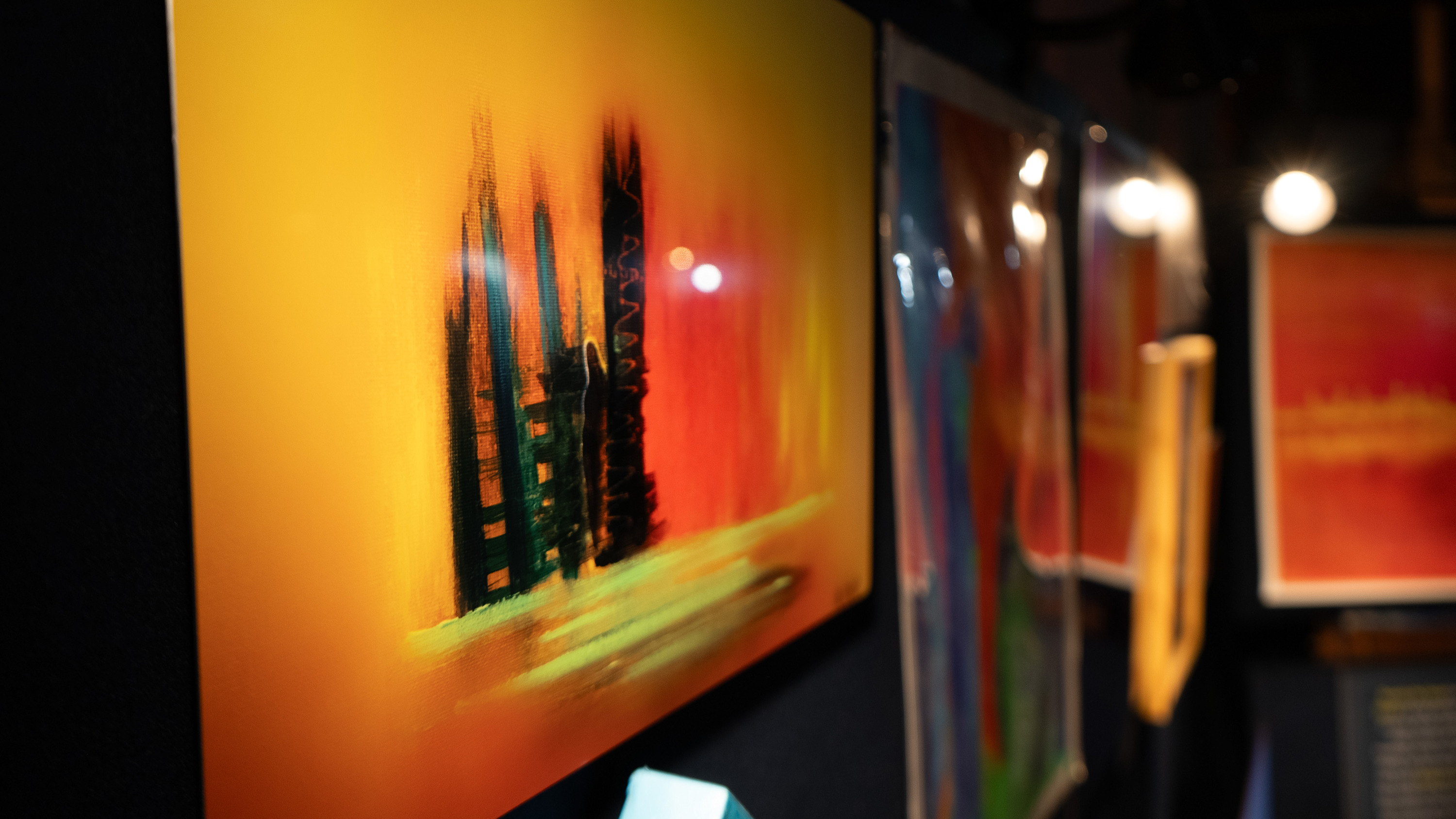 Cleft metal print detail under gallery lights at RAW Toronto Artshow