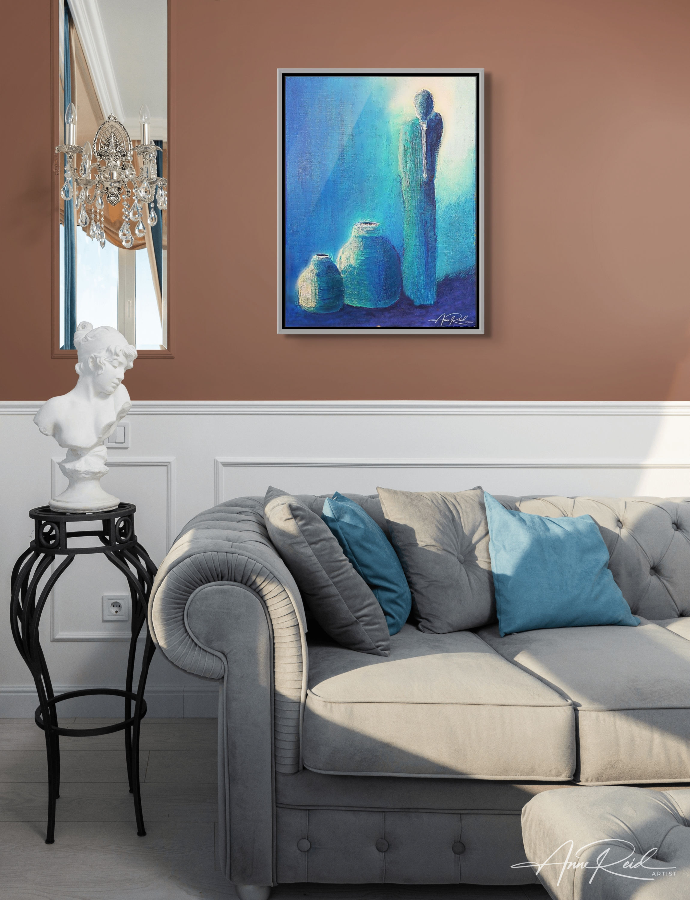 Cool-toned abstract art with figure and pottery above grey tufted sofa in elegant boho space