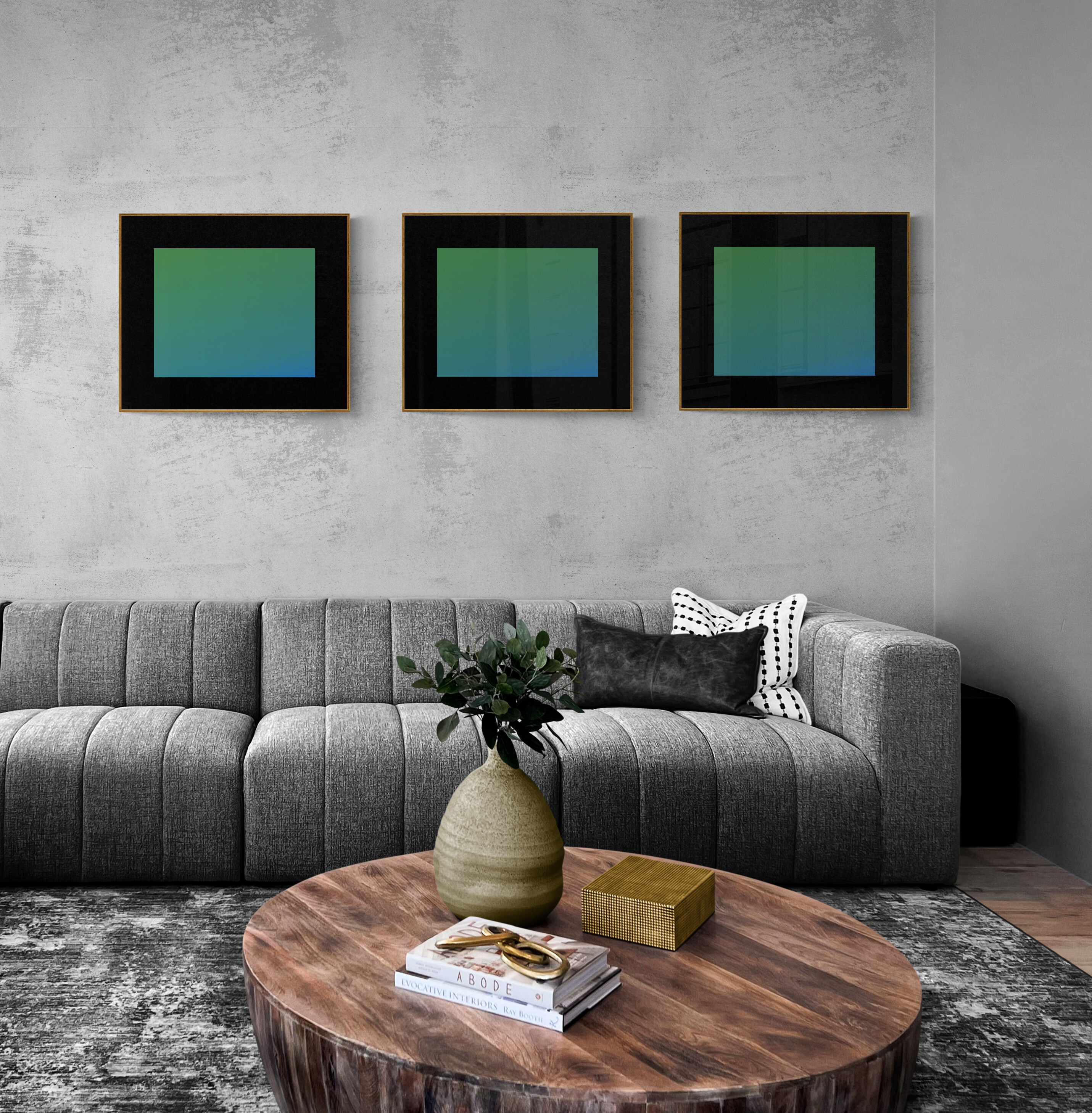 A grouping of three art pieces that are each framed the same way.